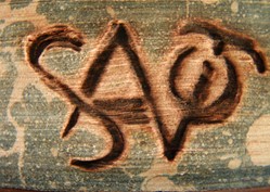 A monogram that appears to say .